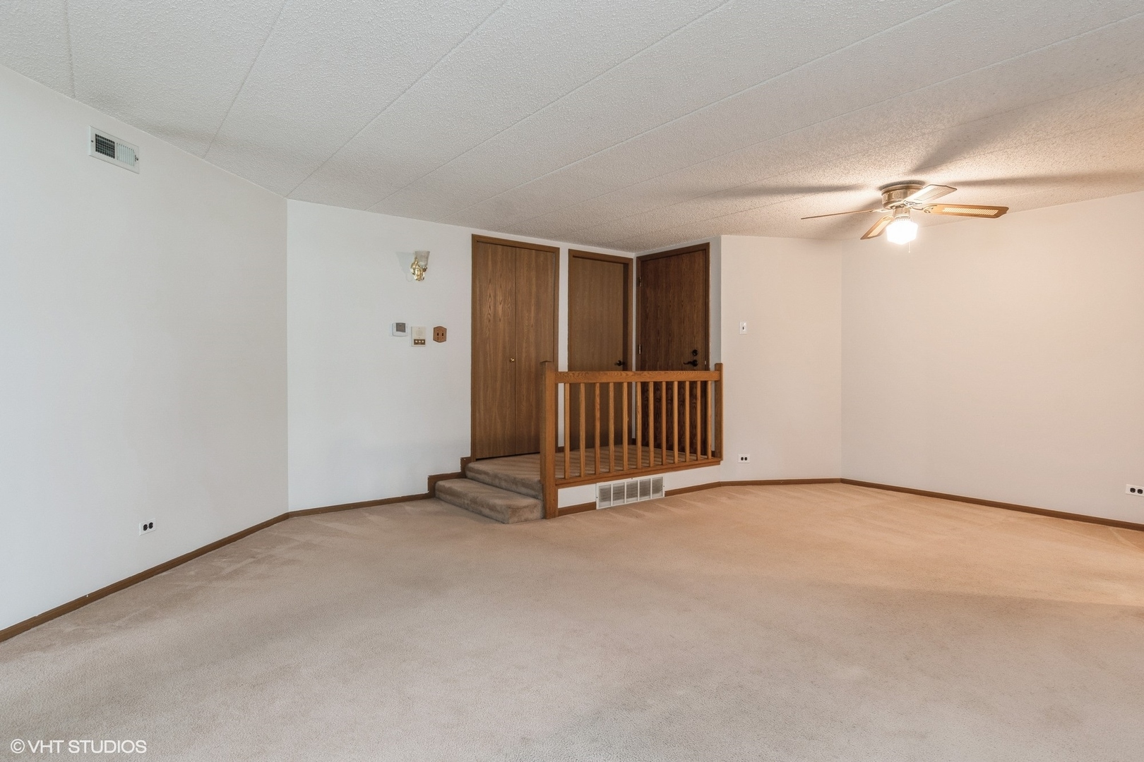 1258 Chalet Road, Unit 101 Naperville, IL 60563 - Photo 3 of 22 an empty room with windows and fan