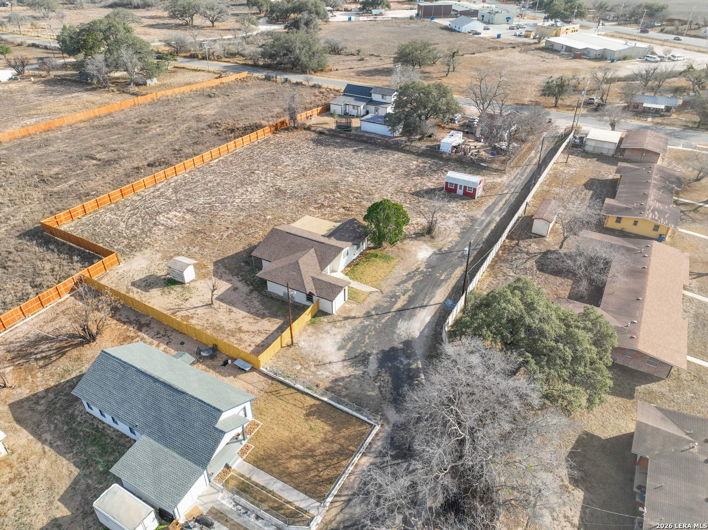 523 A Rossville Road Devine, TX 78016 - Photo 18 of 31 an aerial view of a house with a yard
