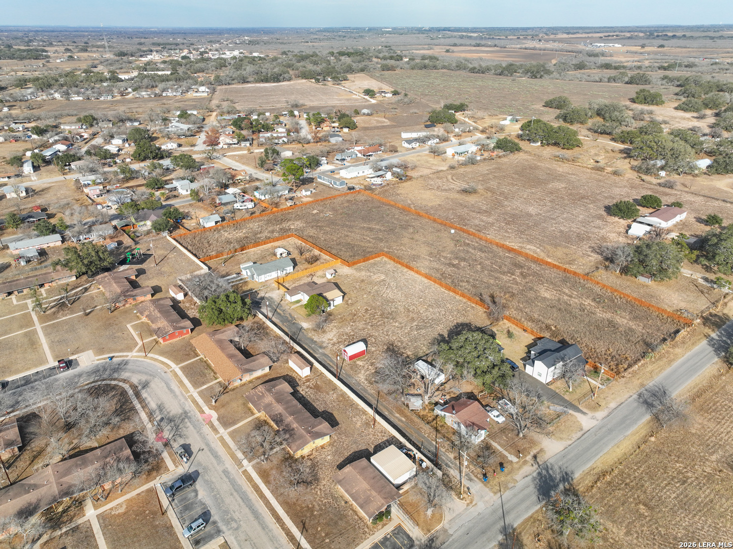 523 A Rossville Road Devine, TX 78016 - Photo 22 of 31 an aerial view of a city