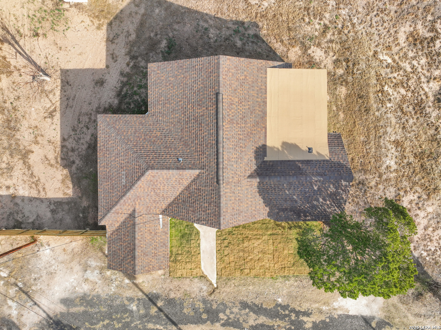 523 A Rossville Road Devine, TX 78016 - Photo 27 of 31 a view of a backyard