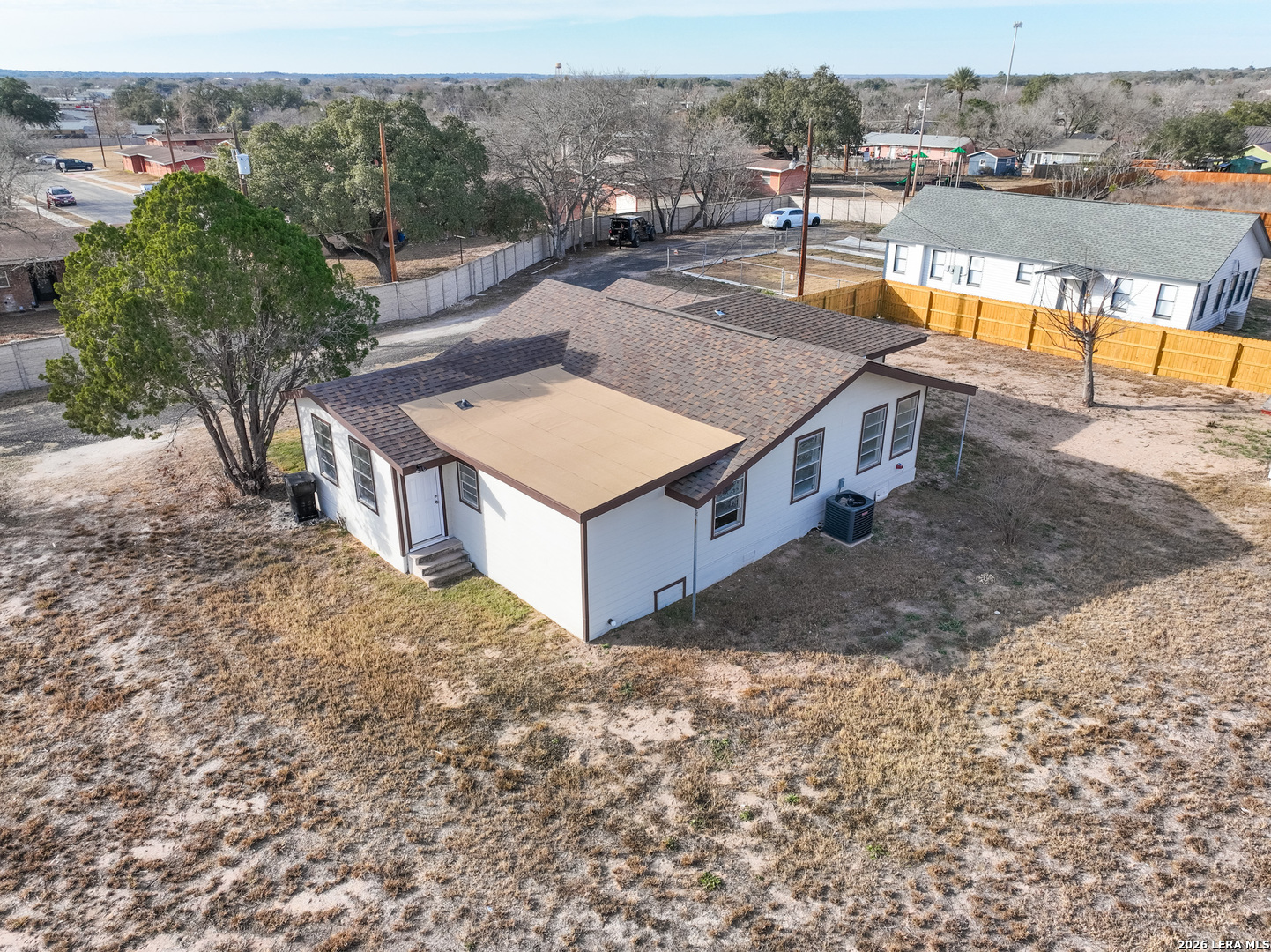 523 A Rossville Road Devine, TX 78016 - Photo 29 of 31 an aerial view of a house with a yard