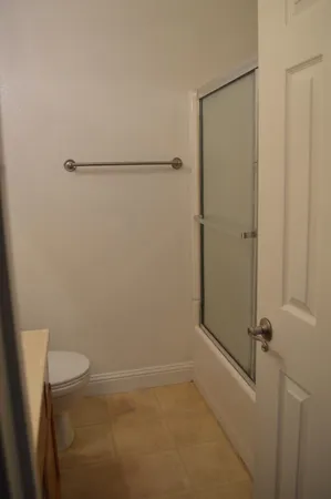 a bathroom with a sink toilet and vanity