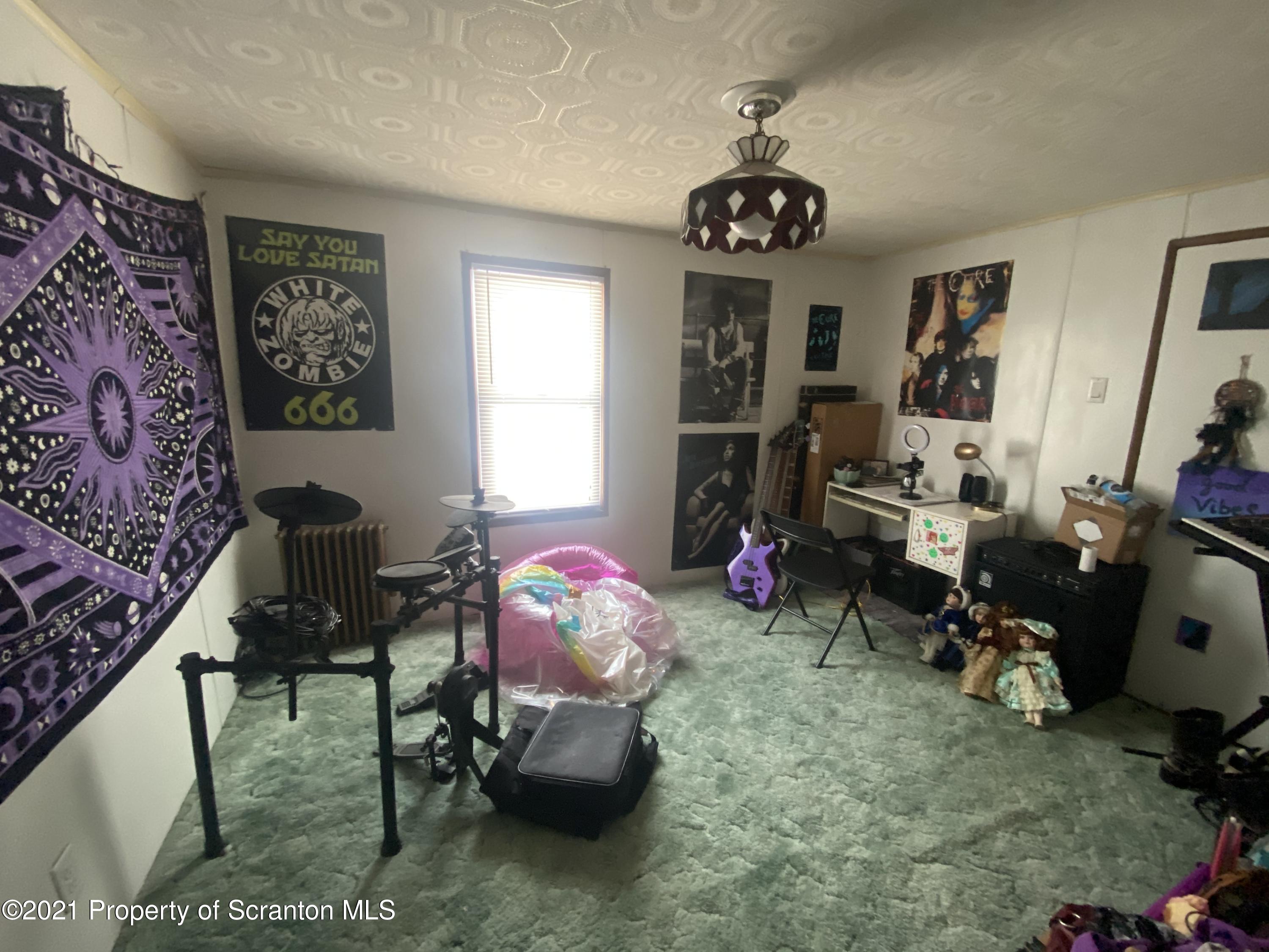 58 Owego Street Simpson, PA 18407 - Photo 7 of 9 a view of a room with workspace and a window