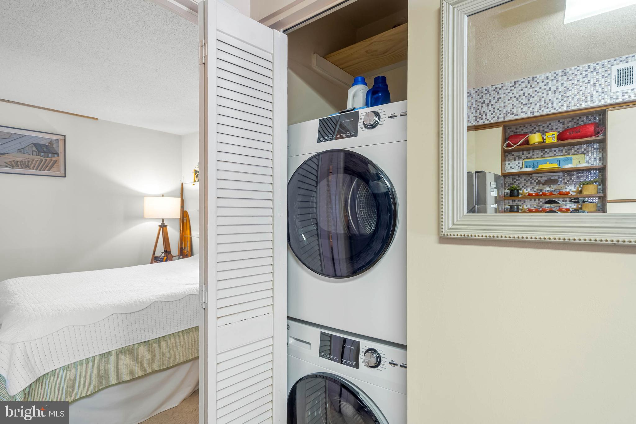 11 144th Street, Unit 102 Ocean City, MD 21842 - Photo 17 of 27 a utility room with dryer and washer