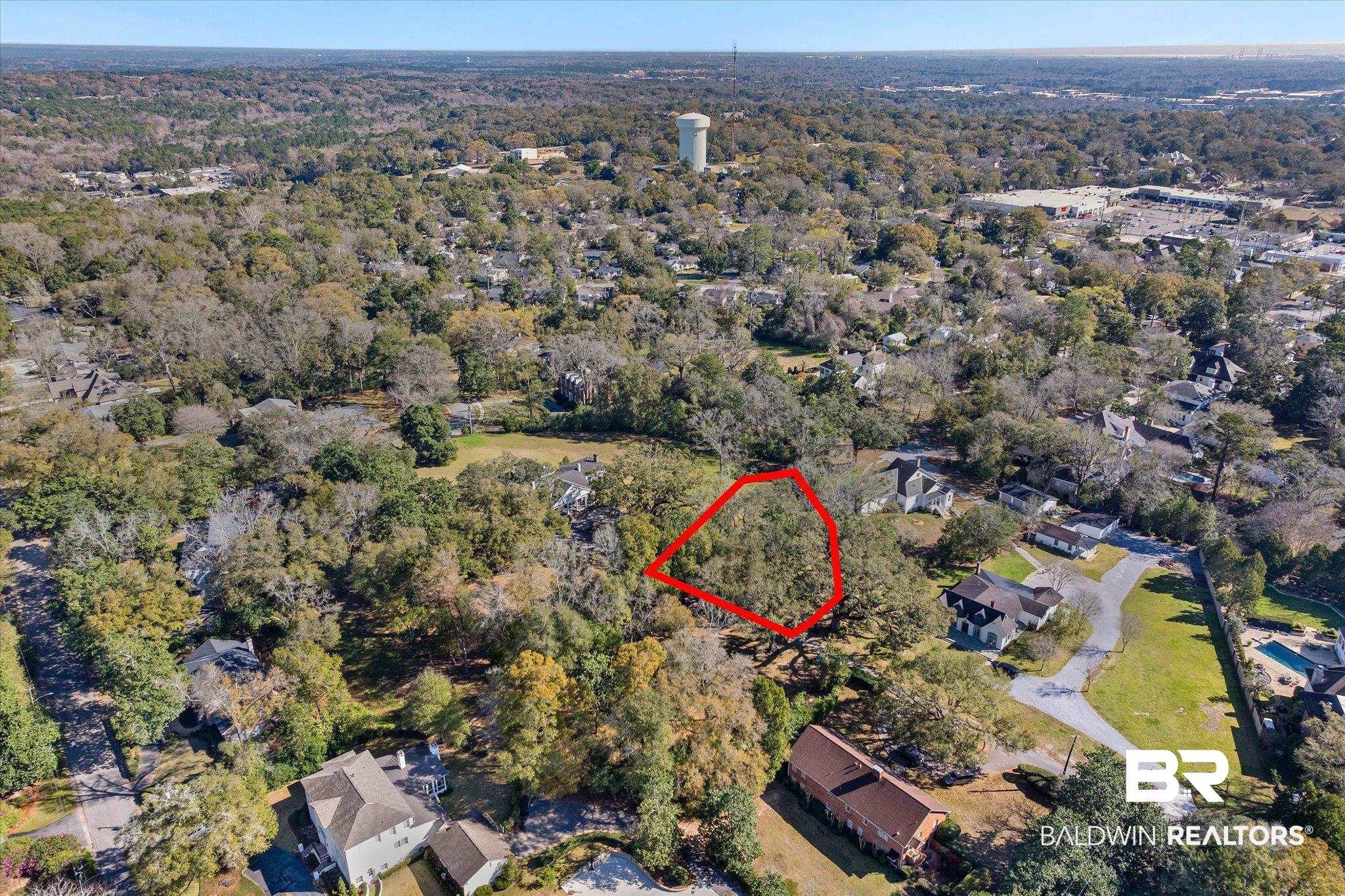 0 Austill Place Mobile, AL 36608 - Photo 7 of 14 Aerial view of property's location with property parcel outlined and a forest