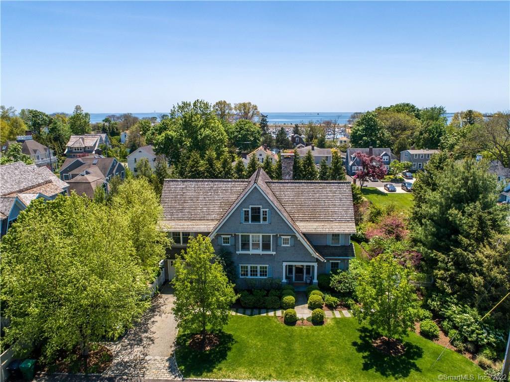 a house with trees in the background
