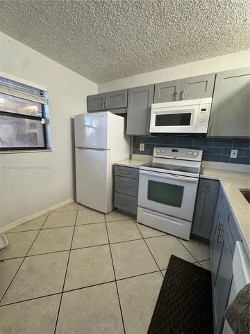 $248,000 | 142 Northwest 91st Avenue, Unit 104, Pembroke Pines, FL 33024