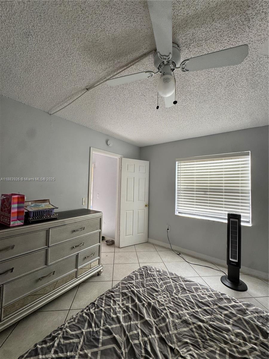 142 Northwest 91st Avenue, Unit 104 Pembroke Pines, FL 33024 - Photo 9 of 15 a view of a livingroom with furniture