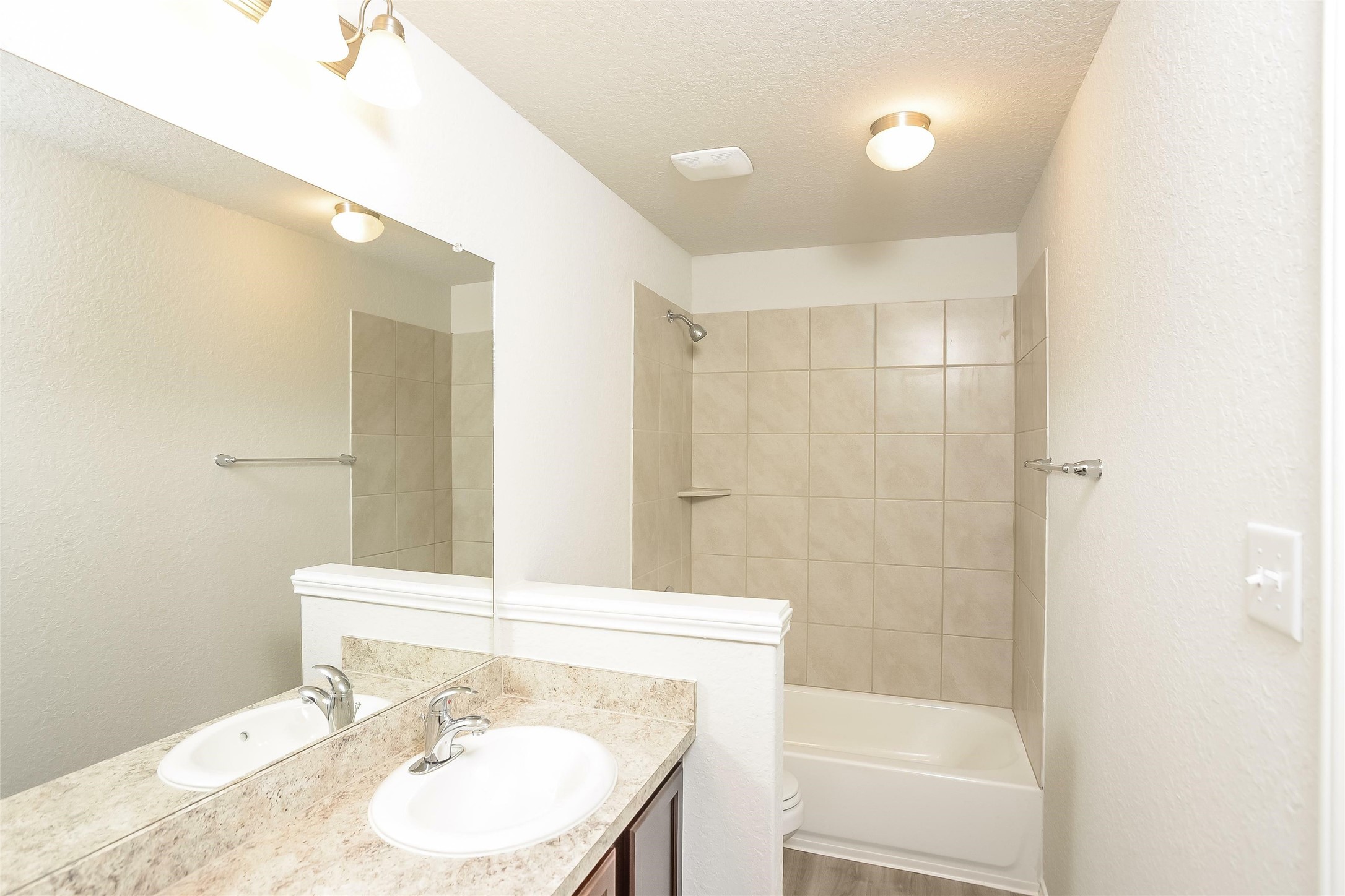 4927 Sweet Chestnut Lane Spring, TX 77373 - Photo 11 of 18 a bathroom with a sink a toilet and shower