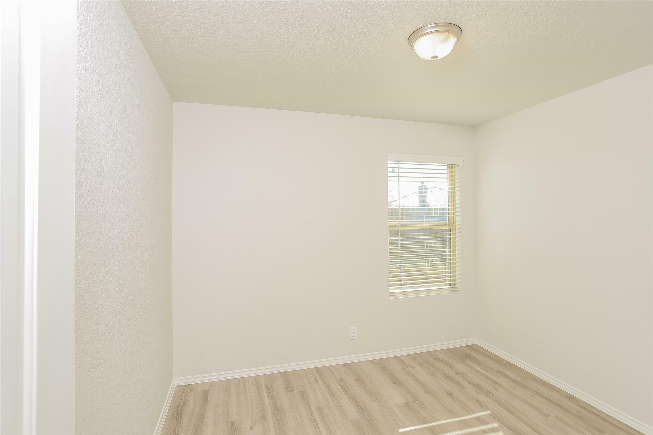 4927 Sweet Chestnut Lane Spring, TX 77373 - Photo 13 of 18 a view of a room that has a window in it