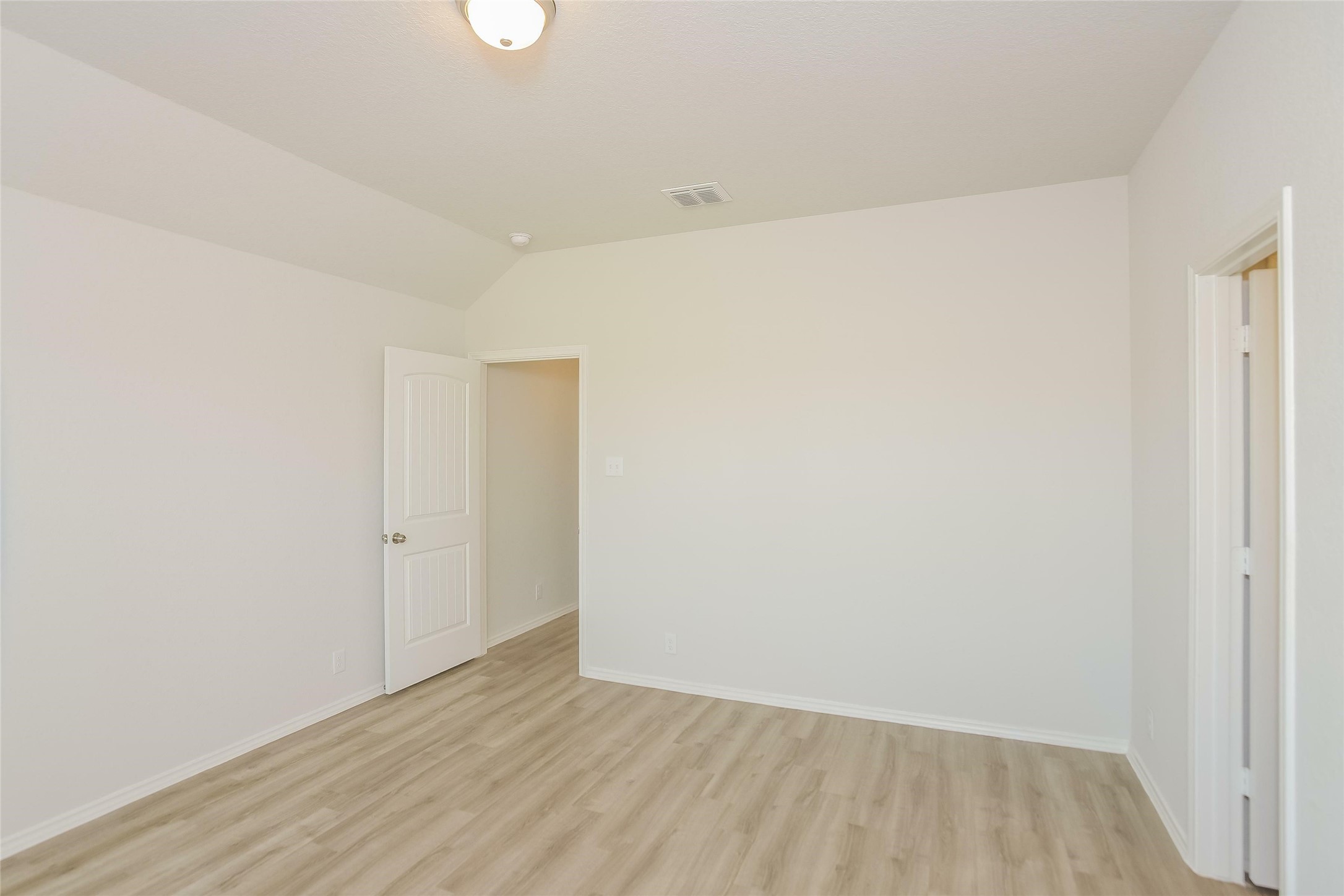 4927 Sweet Chestnut Lane Spring, TX 77373 - Photo 10 of 18 a view of an empty room with wooden floor