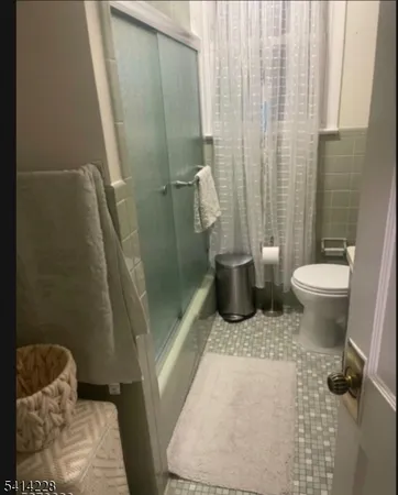 a bathroom with a sink and toilet