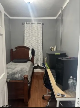a bedroom with a bed and a table