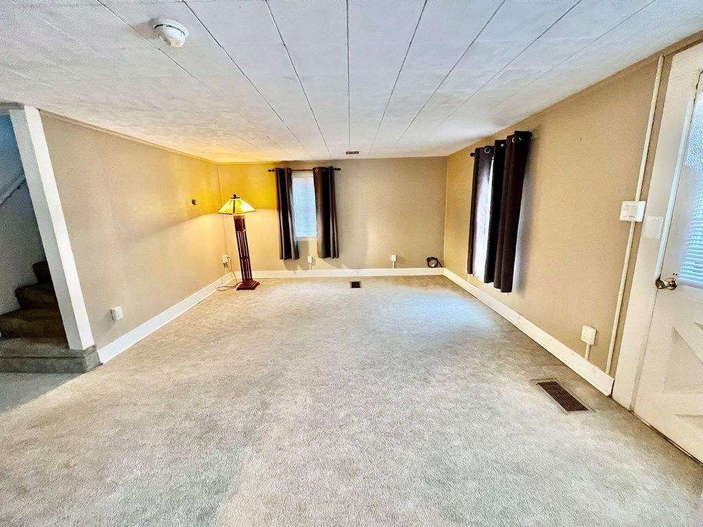 1747 Old Rte 322 Utica, PA 16362 - Photo 6 of 18 a view of a livingroom with a staircase