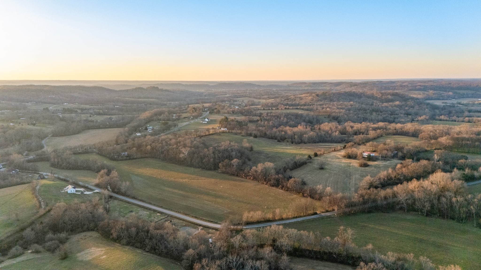 0 Craig Bridge Road Williamsport, TN 38487 - Photo 1 of 20 an aerial view of residential houses with outdoor space and trees