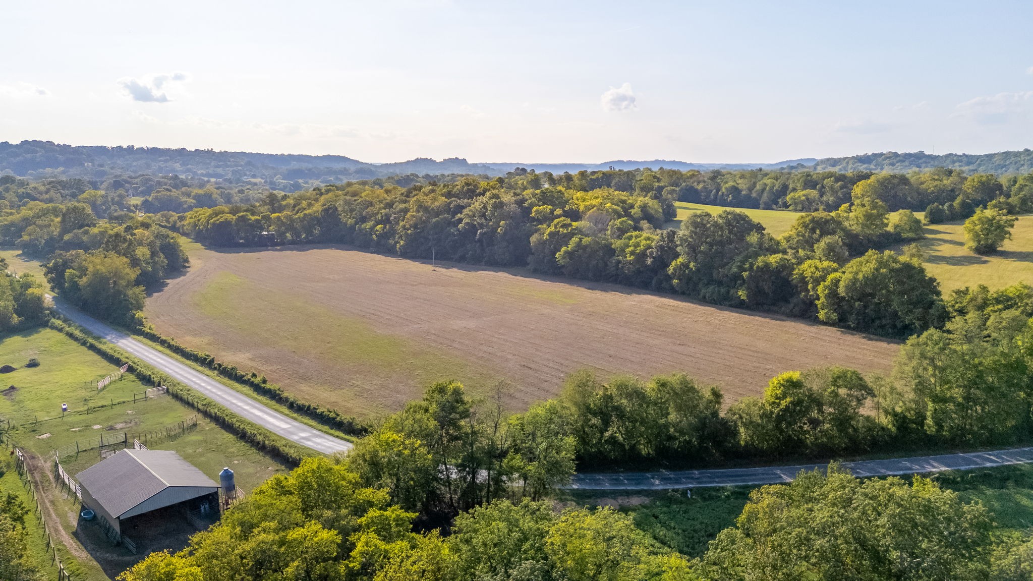 0 Craig Bridge Road Williamsport, TN 38487 - Photo 13 of 20 an aerial view of a house with a garden and lake view