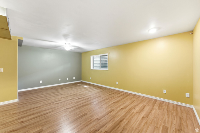 7235 Viansa Court Midvale, UT 84047 - Photo 30 of 43 Unfurnished room featuring light wood-style flooring