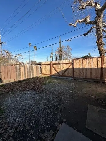 a view of a backyard of a house