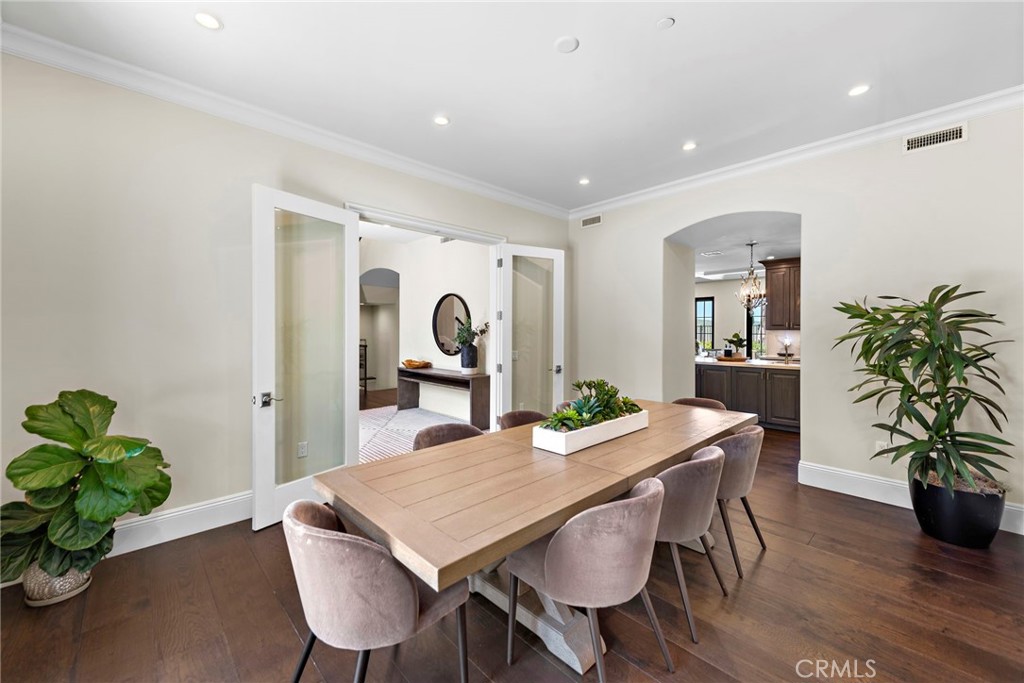 19 Alexa Lane Ladera Ranch, CA 92694 - Photo 11 of 63 a dining room with furniture potted plants and wooden floor
