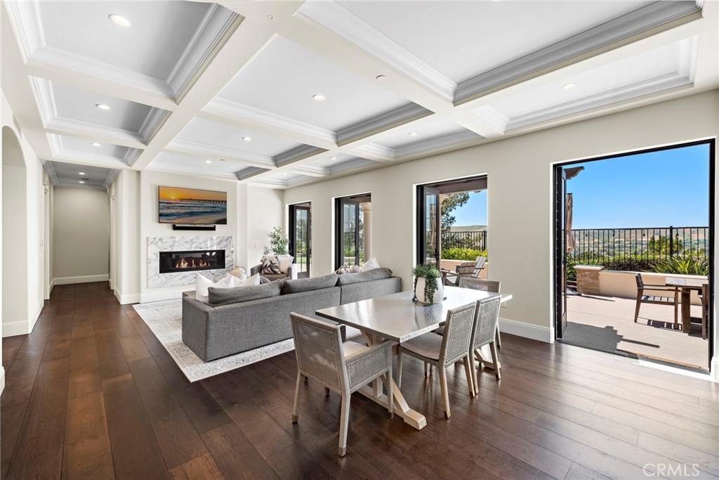 19 Alexa Lane Ladera Ranch, CA 92694 - Photo 16 of 63 a view of a dining room with furniture window and wooden floor
