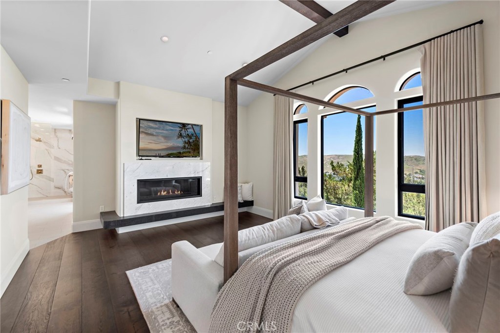 19 Alexa Lane Ladera Ranch, CA 92694 - Photo 27 of 63 a bedroom with furniture and a large window