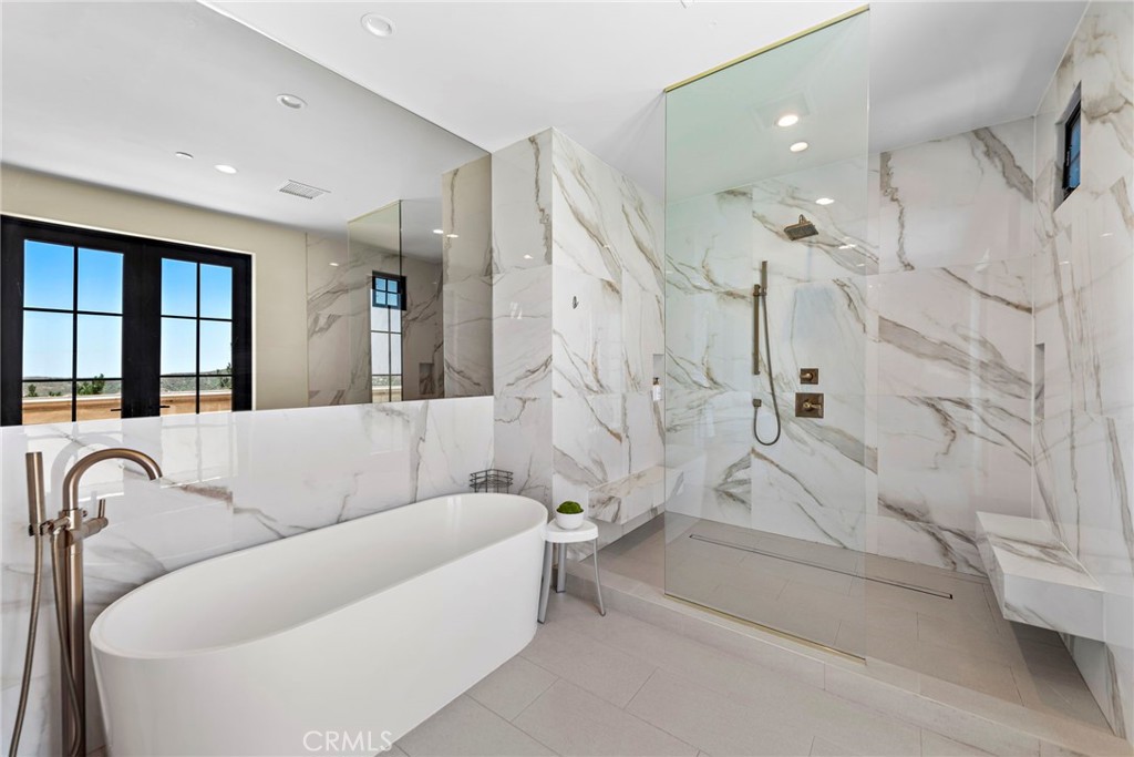 19 Alexa Lane Ladera Ranch, CA 92694 - Photo 29 of 63 a living room with furniture and a large window