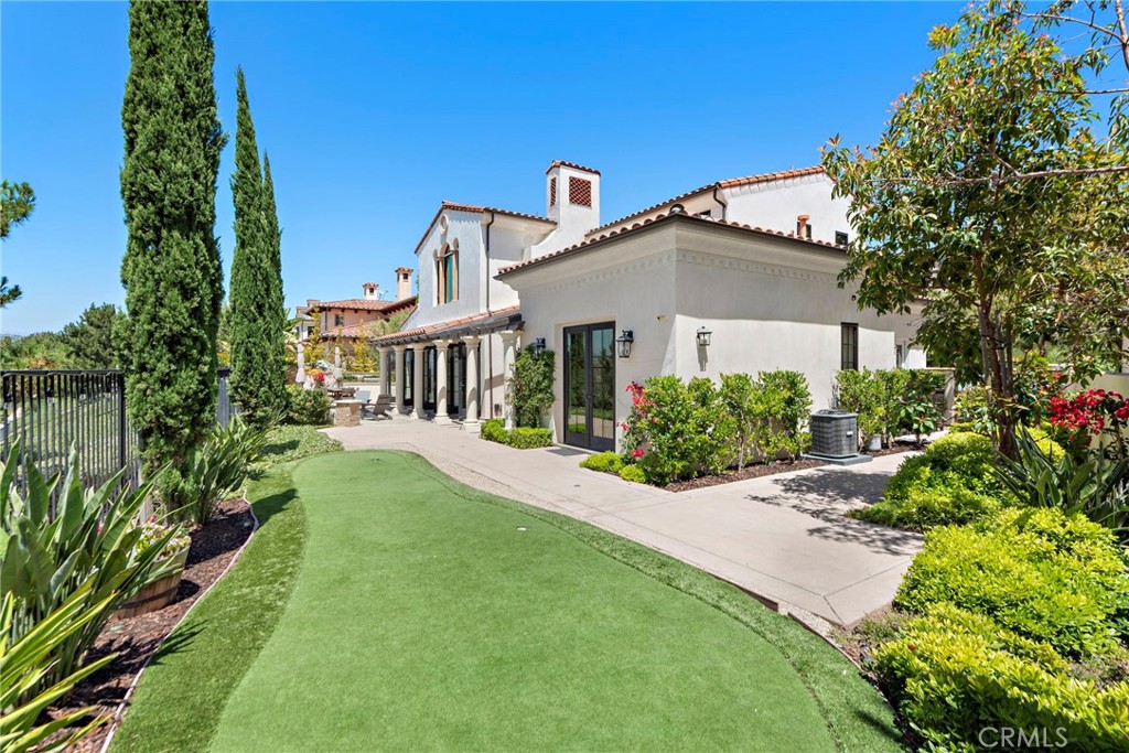 19 Alexa Lane Ladera Ranch, CA 92694 - Photo 4 of 63 a front view of a house with a yard
