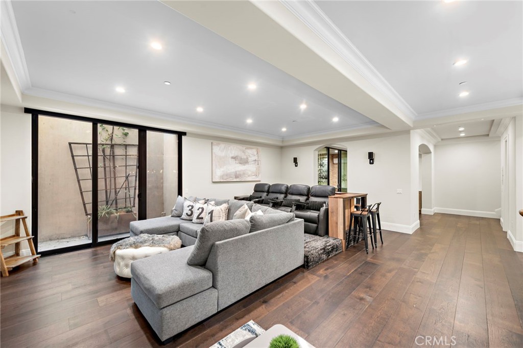 19 Alexa Lane Ladera Ranch, CA 92694 - Photo 42 of 63 a living room with furniture and a large window