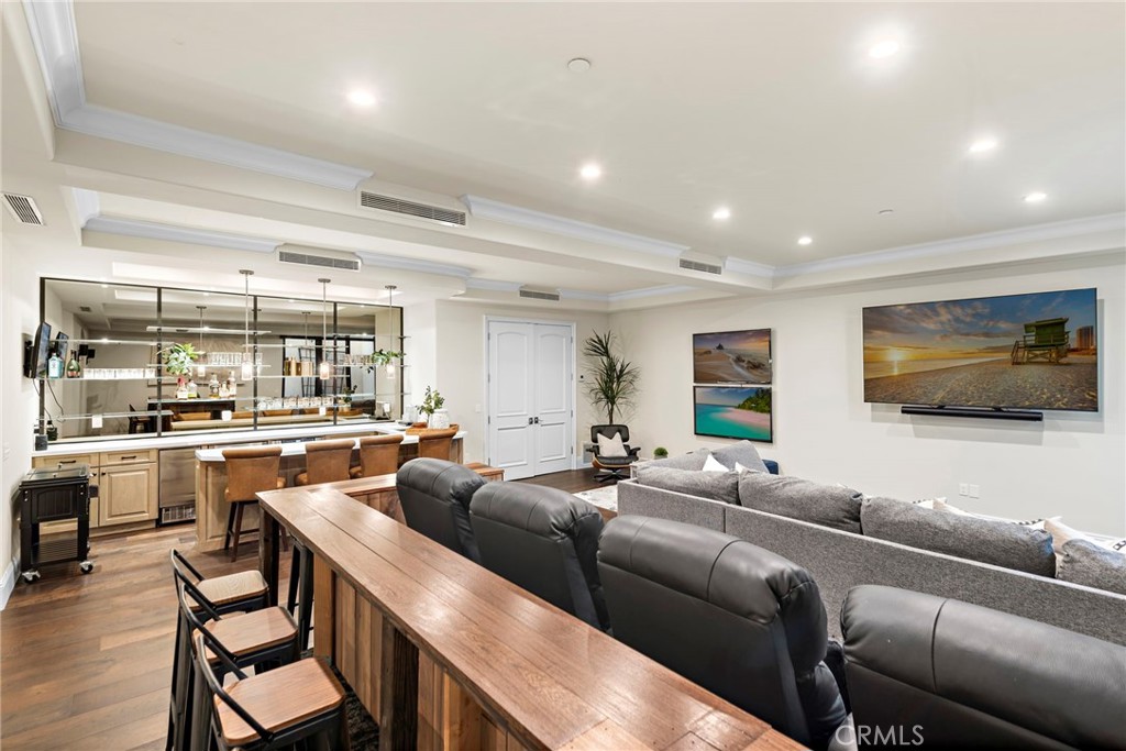 19 Alexa Lane Ladera Ranch, CA 92694 - Photo 43 of 63 a living room with furniture and a flat screen tv