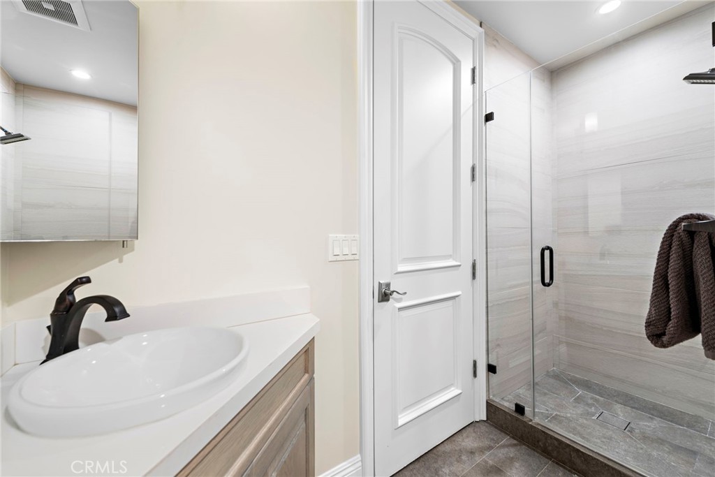 19 Alexa Lane Ladera Ranch, CA 92694 - Photo 46 of 63 a bathroom with a sink and a shower