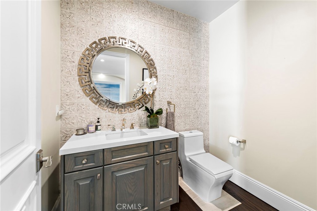 19 Alexa Lane Ladera Ranch, CA 92694 - Photo 47 of 63 a bathroom with a sink and a mirror