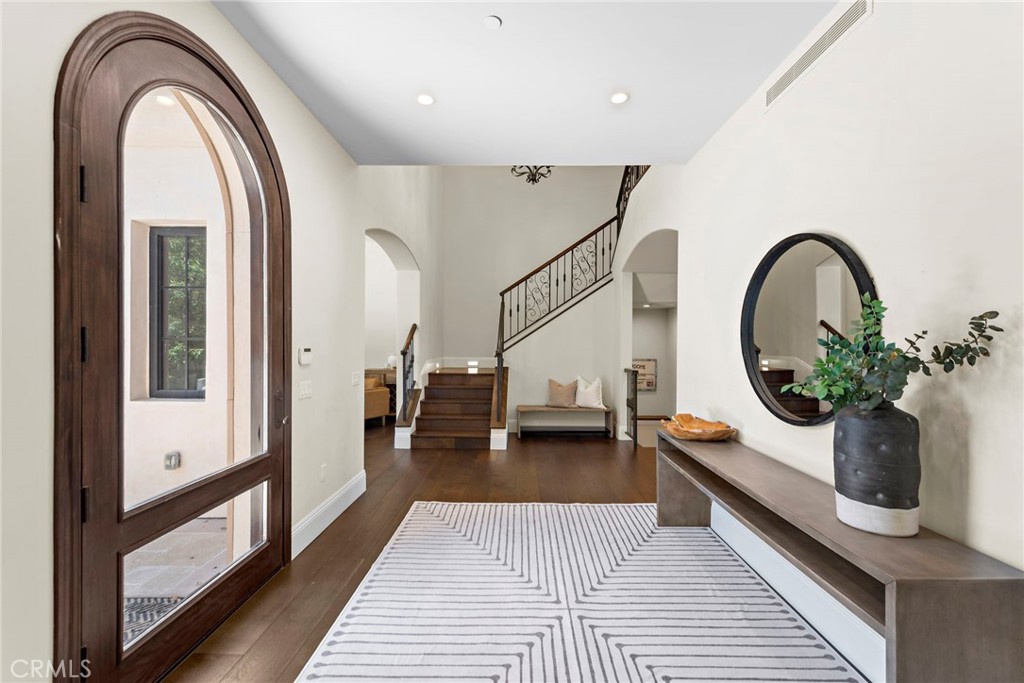 19 Alexa Lane Ladera Ranch, CA 92694 - Photo 8 of 63 a living room with furniture and a potted plant