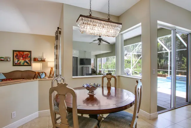 a bedroom with bed and wooden floor