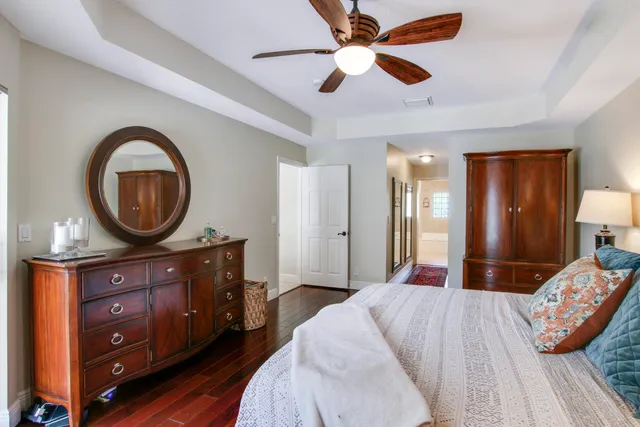 a bath tub sitting in a bathroom next to a window