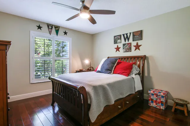 a bathroom with a sink toilet and mirror