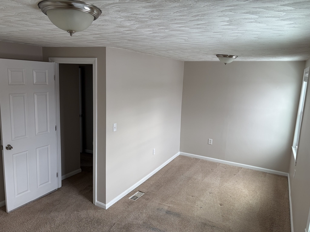 378 Union Street, Unit 2 Franklin, MA 02038 - Photo 5 of 5 a view of an empty room