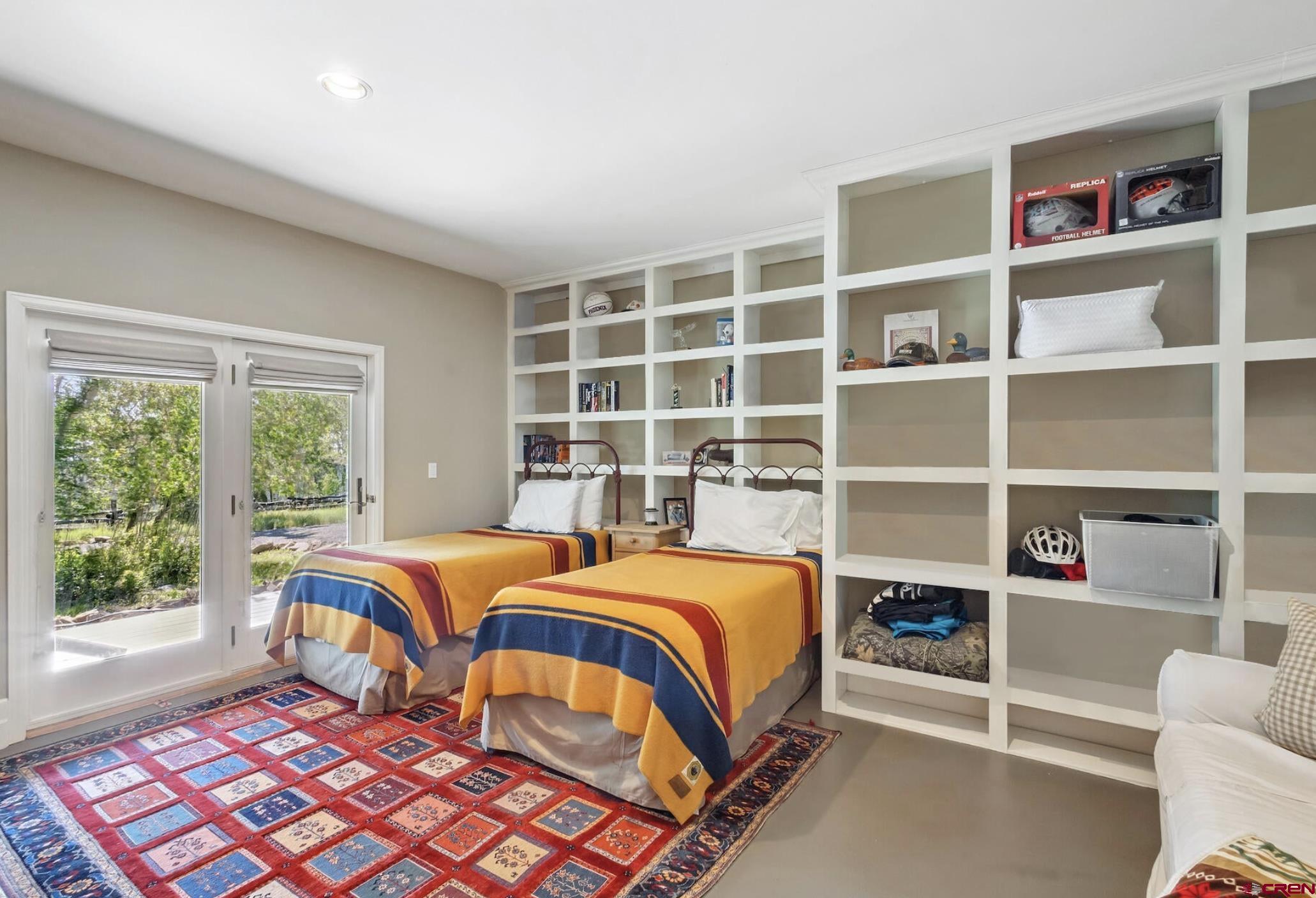 3289 Laughing Dog Road Placerville, CO 81430 - Photo 20 of 35 a bedroom with a bed and a window