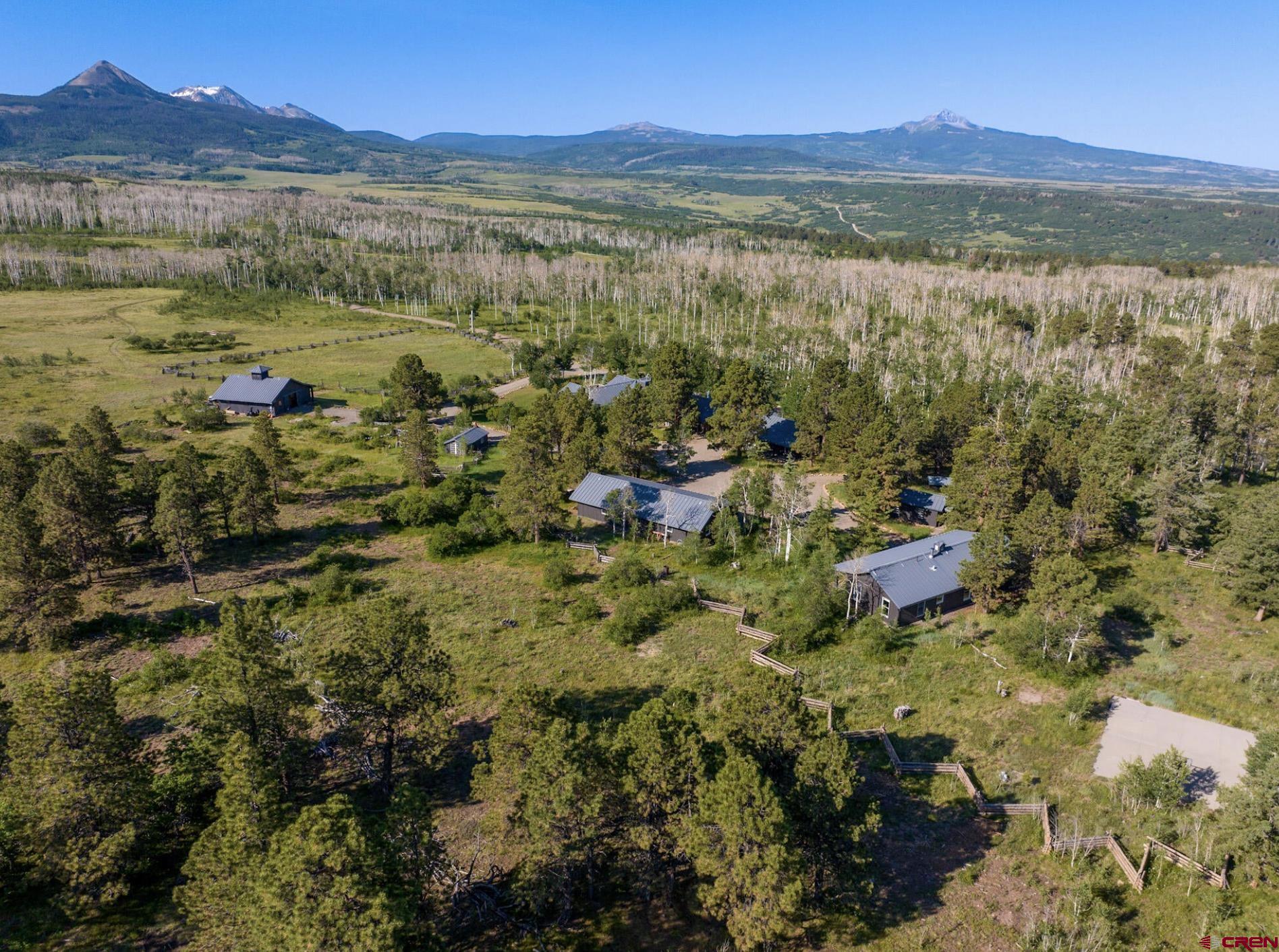 3289 Laughing Dog Road Placerville, CO 81430 - Photo 2 of 35 a view of lake with mountain