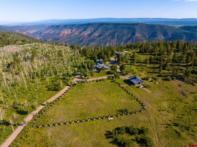 a view of swimming pool and mountain in the background