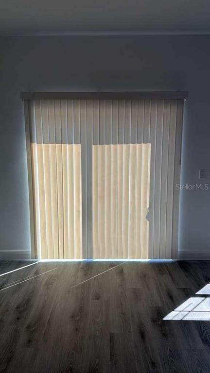 5669 North Claremont Drive Citrus Springs, FL 34434 - Photo 13 of 20 an empty room with wooden floor