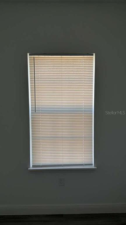 5669 North Claremont Drive Citrus Springs, FL 34434 - Photo 17 of 20 a bathroom with a window