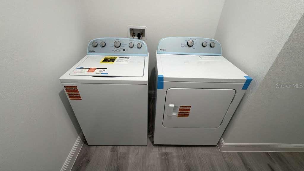 5669 North Claremont Drive Citrus Springs, FL 34434 - Photo 20 of 20 a utility room with dryer and washer