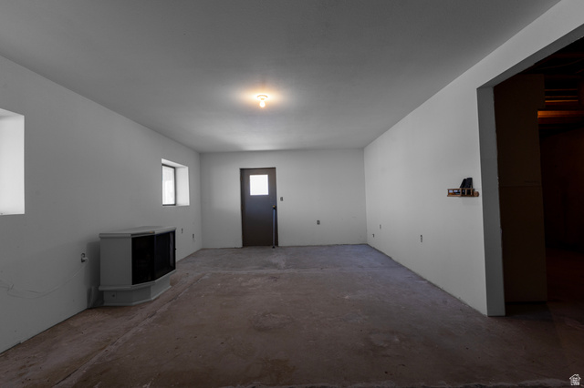 1208 East Tidwell Road Loa, UT 84747 - Photo 31 of 40 Entrance foyer featuring unfinished concrete floors