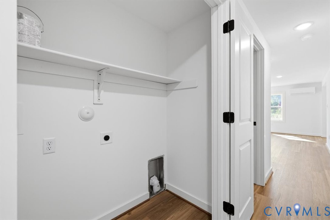 15221 Wright Road Amelia Court House, VA 23002 - Photo 14 of 22 Dedicated laundry area featuring a white storage s