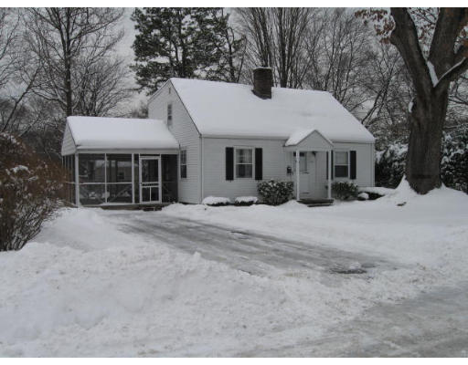 162 Mayflower Road Springfield, MA 01118 - Photo 1 of 14 a view of a white house with a yard covered the house