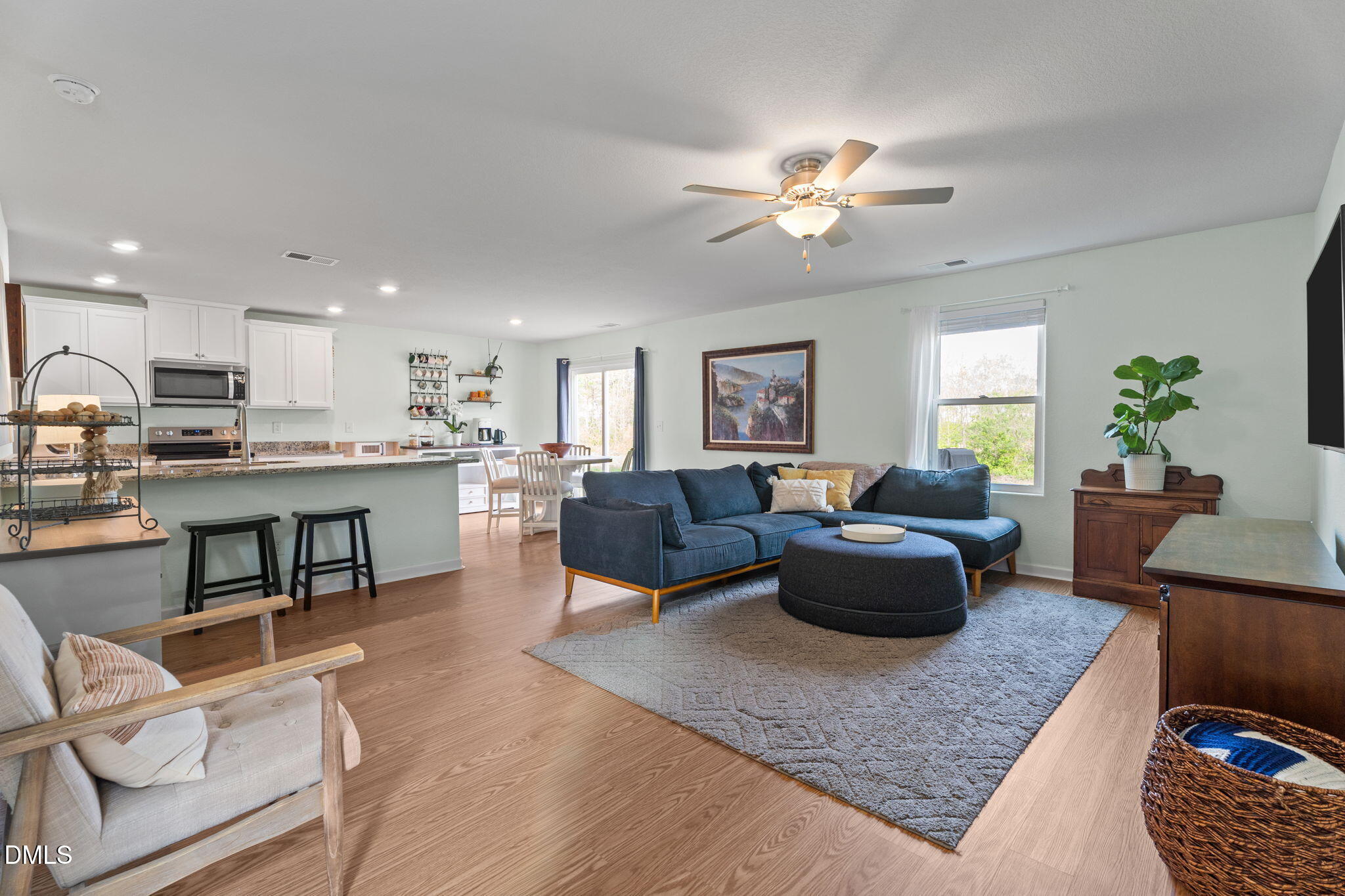 357 Gourd Street Zebulon, NC 27597 - Photo 14 of 50 a living room with furniture and kitchen view