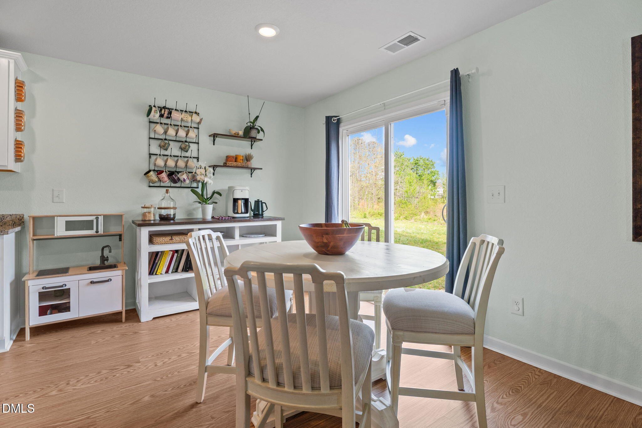 357 Gourd Street Zebulon, NC 27597 - Photo 16 of 50 a dining room with furniture and a large window