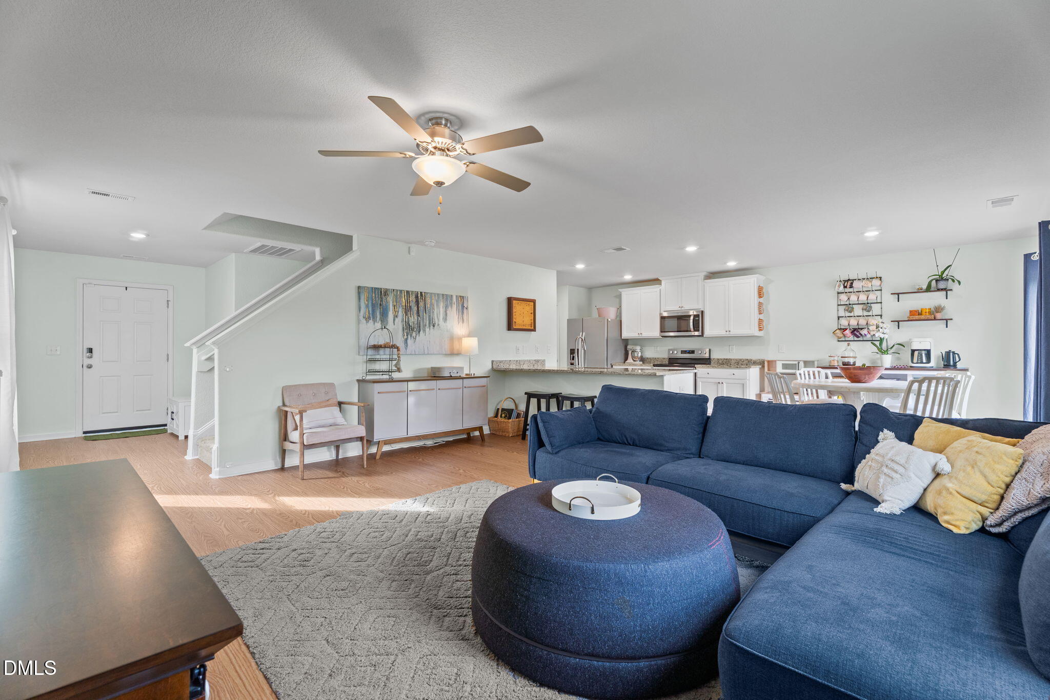357 Gourd Street Zebulon, NC 27597 - Photo 22 of 50 a living room with furniture and kitchen view