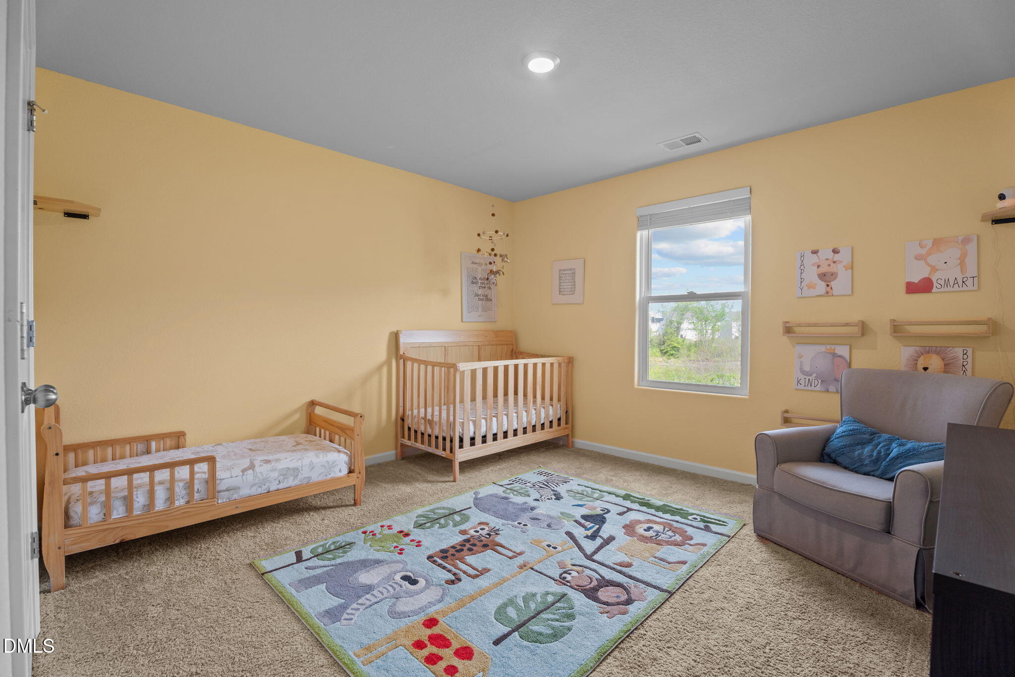 357 Gourd Street Zebulon, NC 27597 - Photo 31 of 50 a living room with furniture and a window