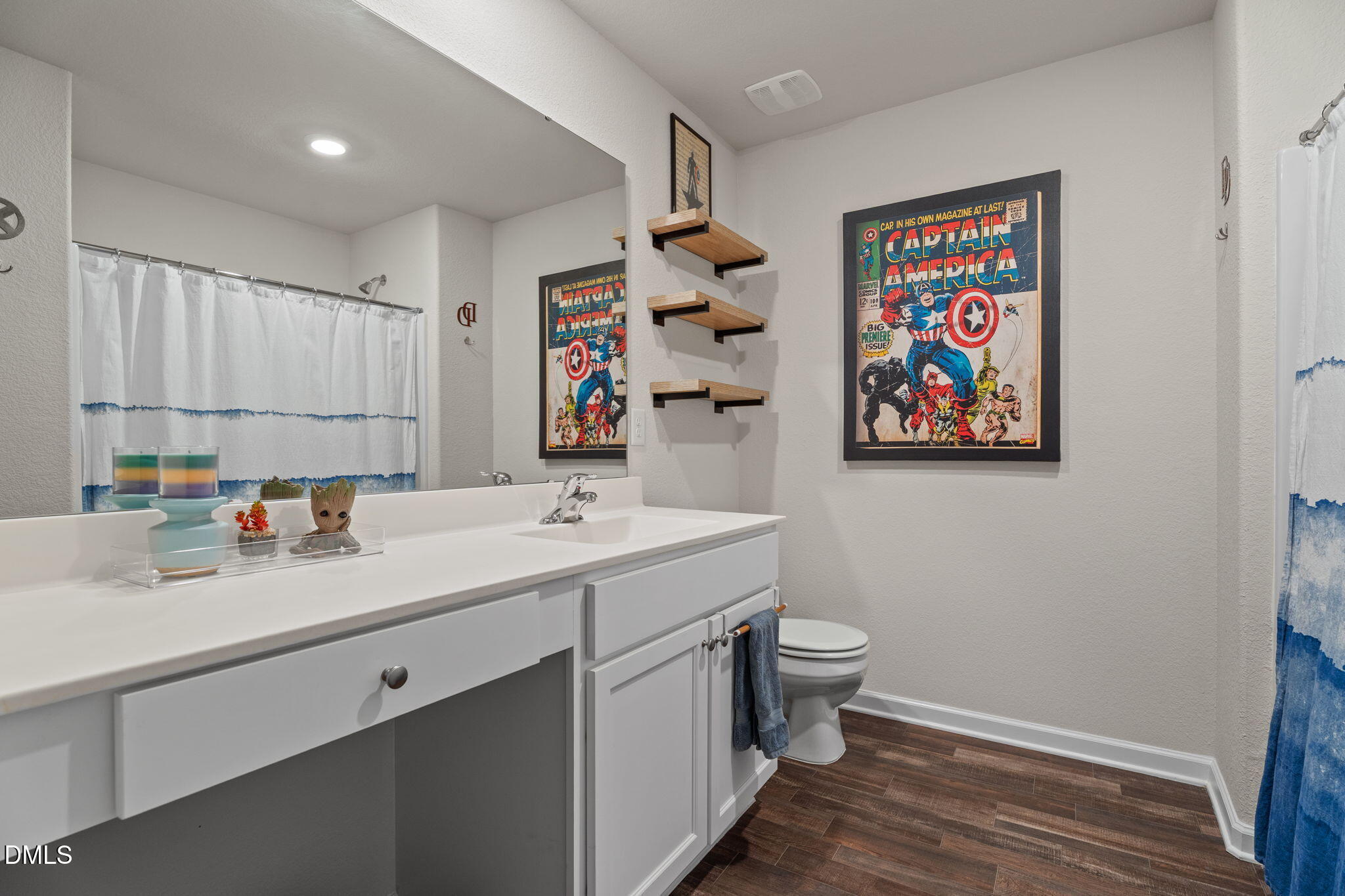 357 Gourd Street Zebulon, NC 27597 - Photo 36 of 50 a view of bathroom with double vanity sink and a window